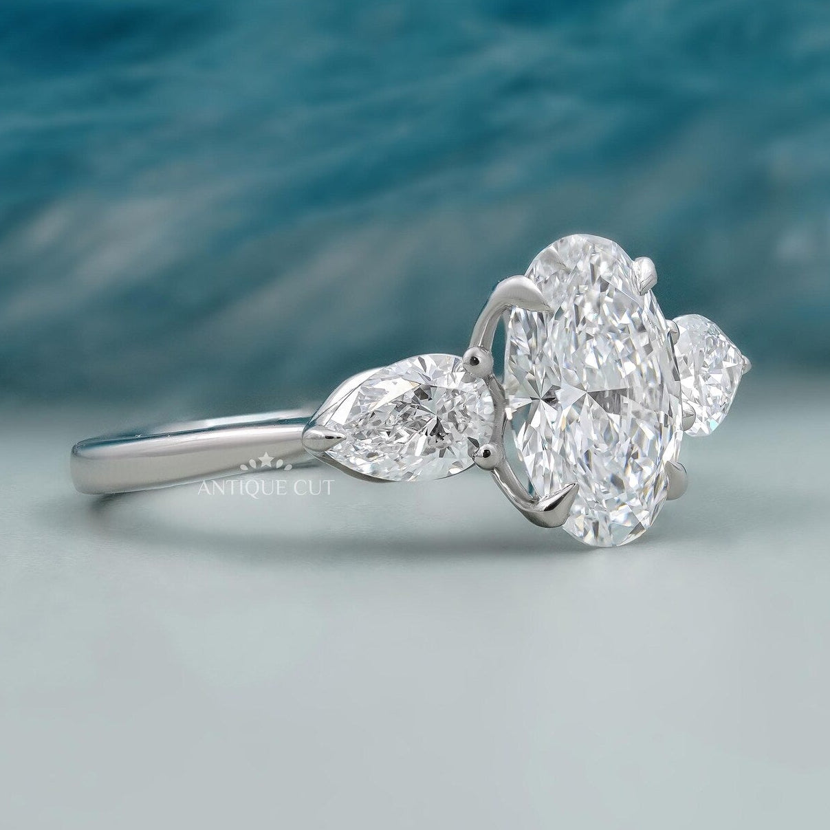 Three Stone Oval Cut Diamond Ring