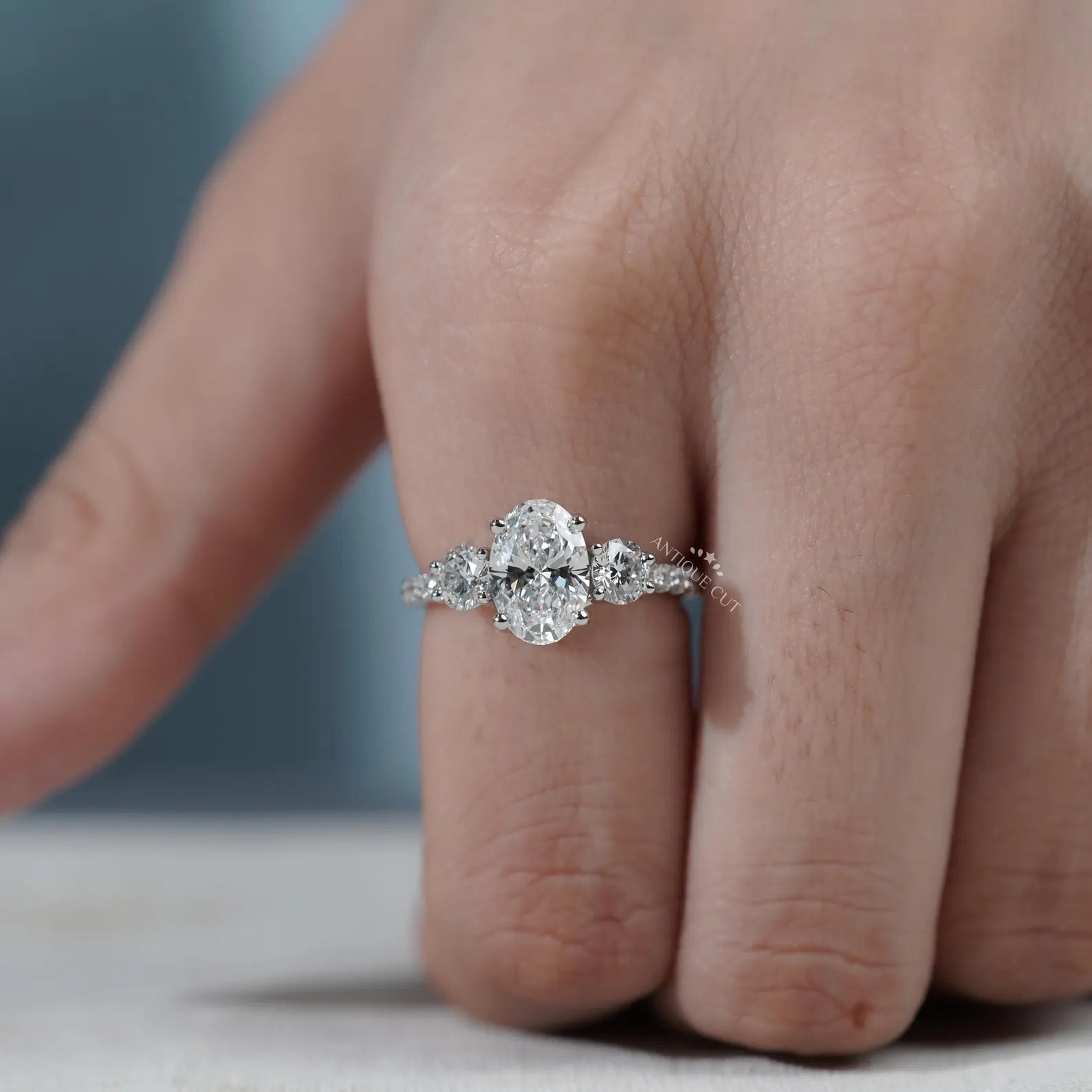 Oval Cut Diamond Ring with Pave Band