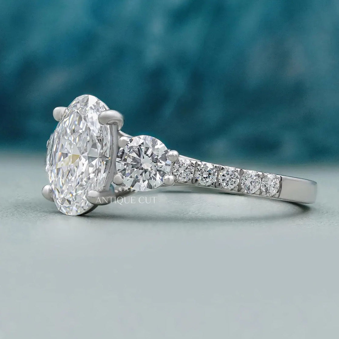 Oval Cut Diamond Ring with Pave Band