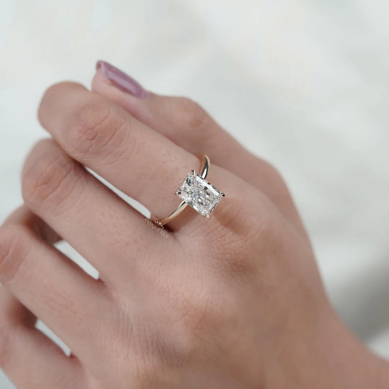 Hidden Halo Radiant Cut Diamond Solitaire Engagement Ring