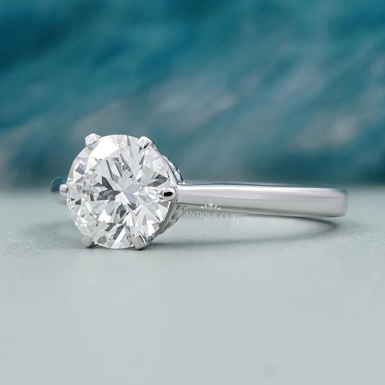 Solitaire Diamond Round Cut Engagement Ring with cathedral set