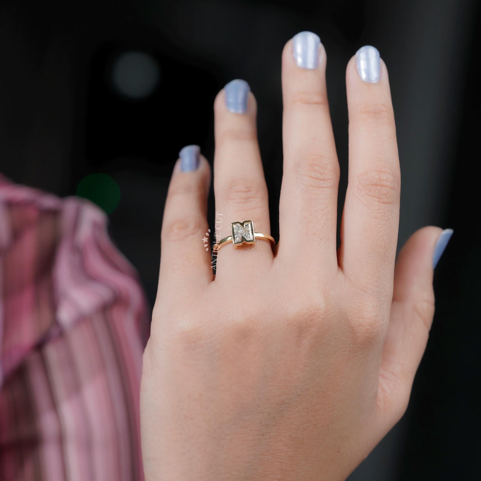 Bezel set N letter ring with IGI certified lab grown diamonds