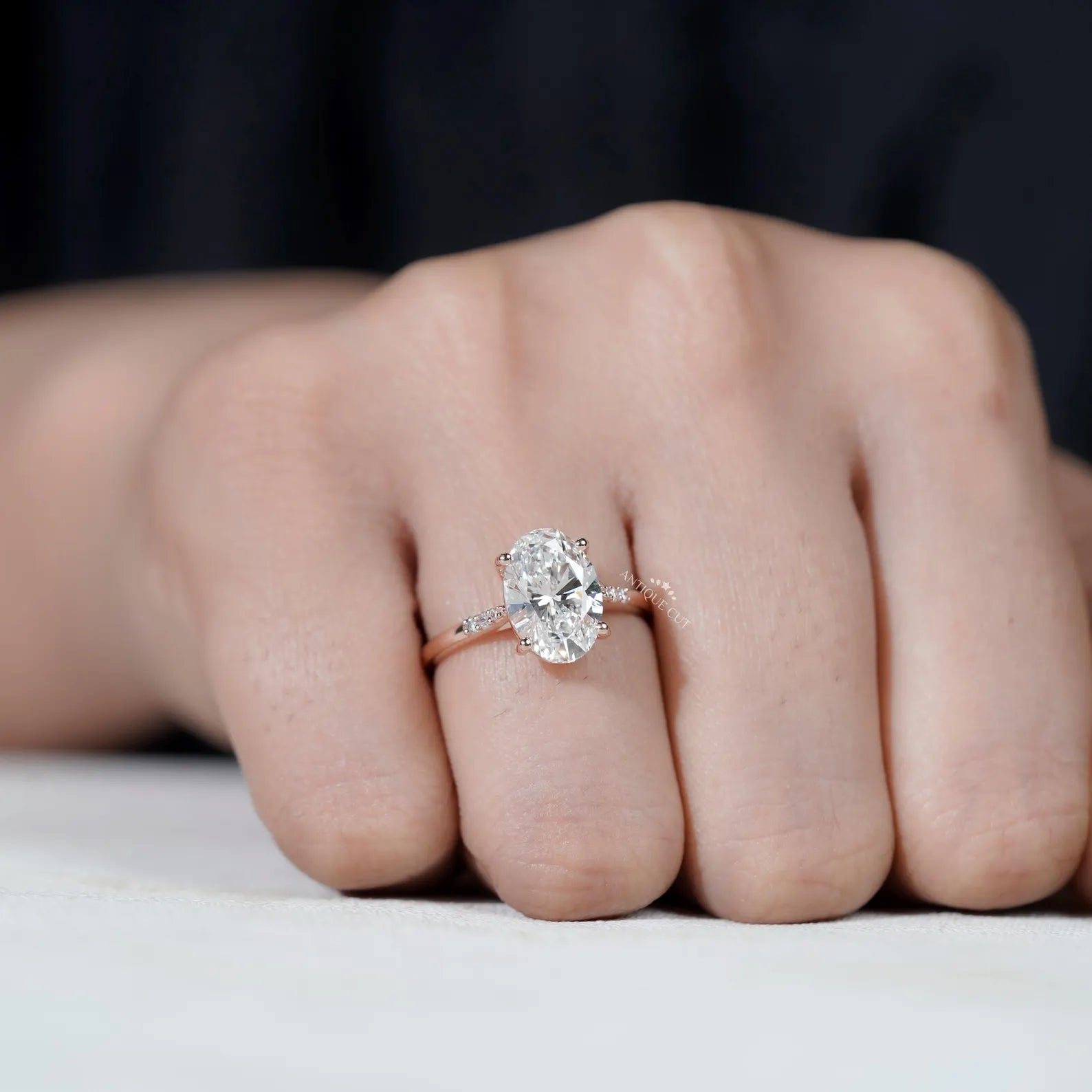 Rose gold engagement ring with oval lab grown diamond