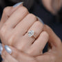 Oval cut diamond ring with round prong setting