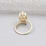 Pear shaped lab grown diamond ring with V prong and yellow gold band