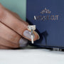 Yellow gold lab grown diamond engagement ring with cushion cut center stone
