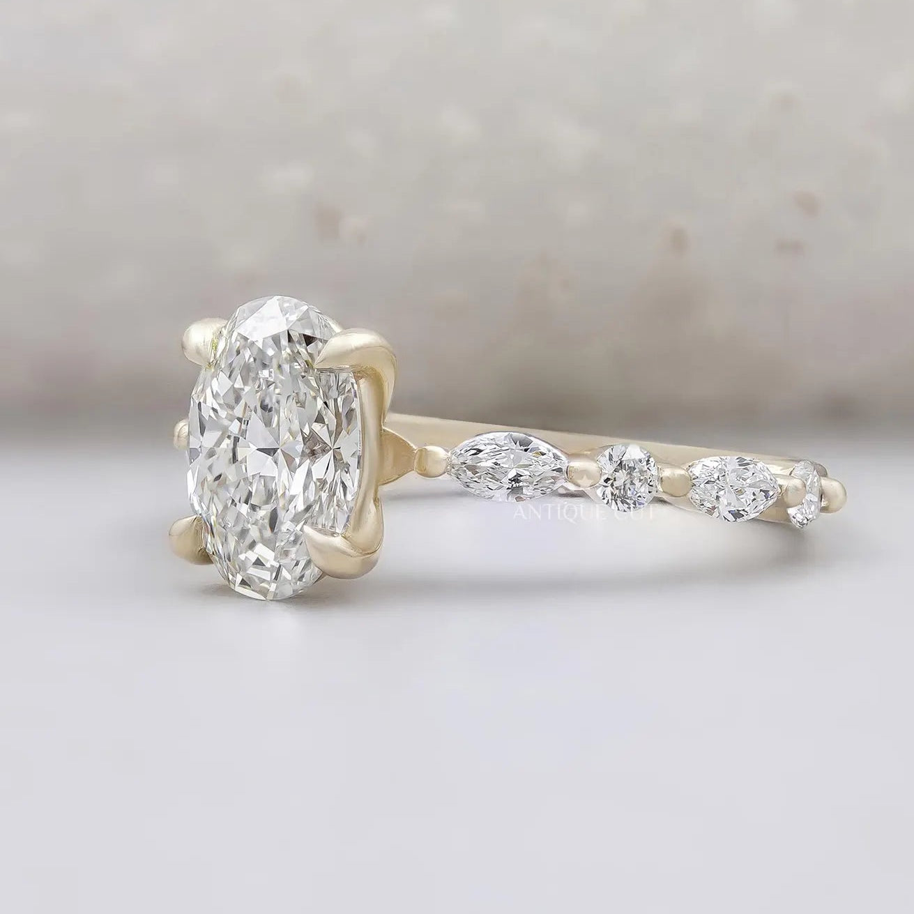 Marquise side stone diamond wedding ring