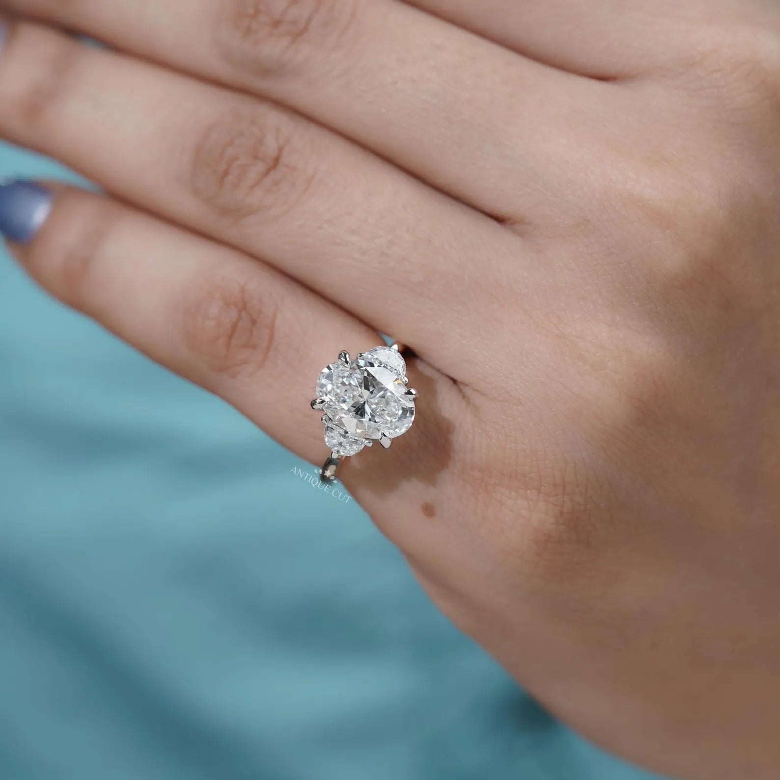 Oval Engagement Ring with Three Stone in Yellow Gold