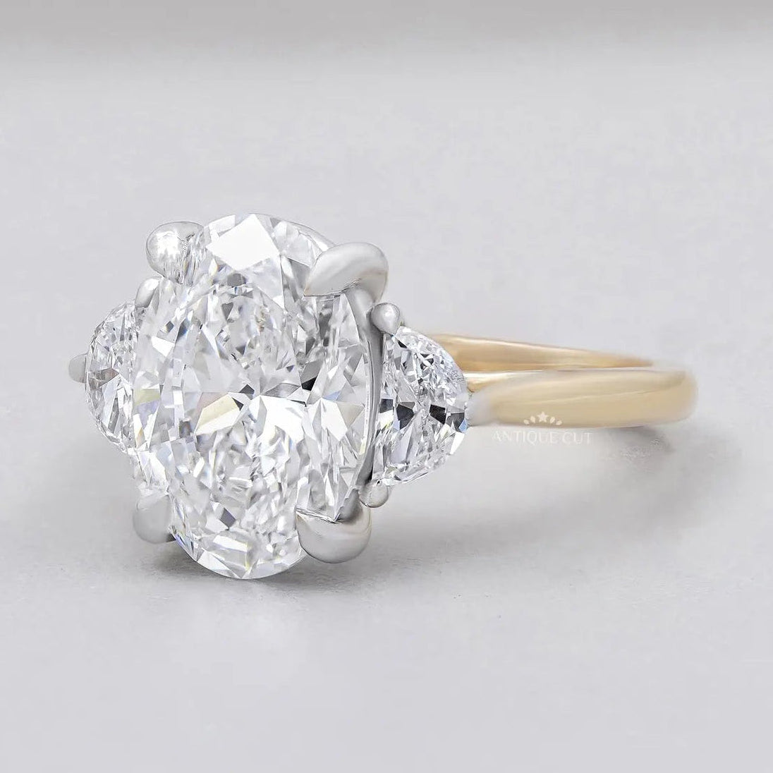 Oval Engagement Ring with Three Stone in Yellow Gold