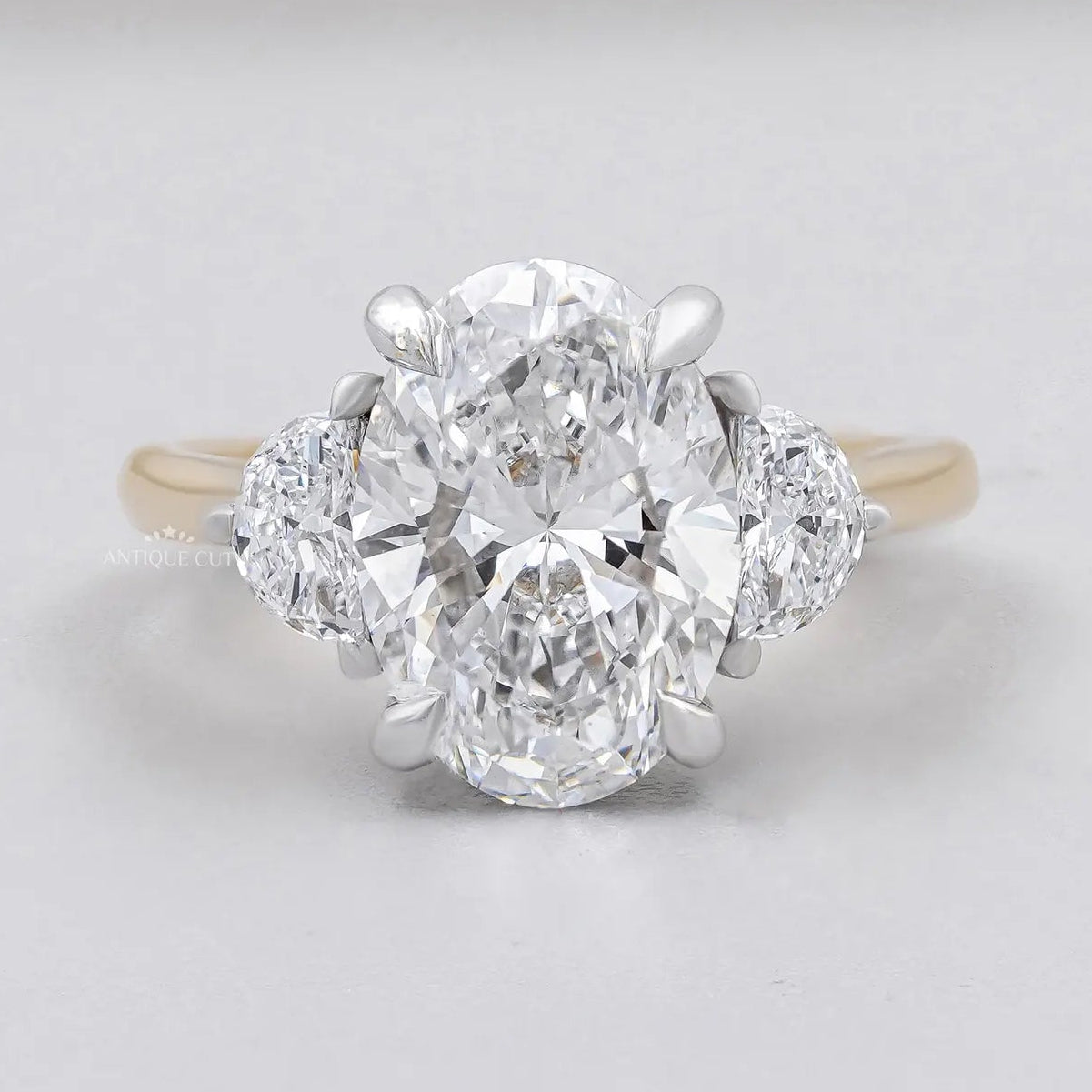 Oval Engagement Ring with Three Stone in Yellow Gold