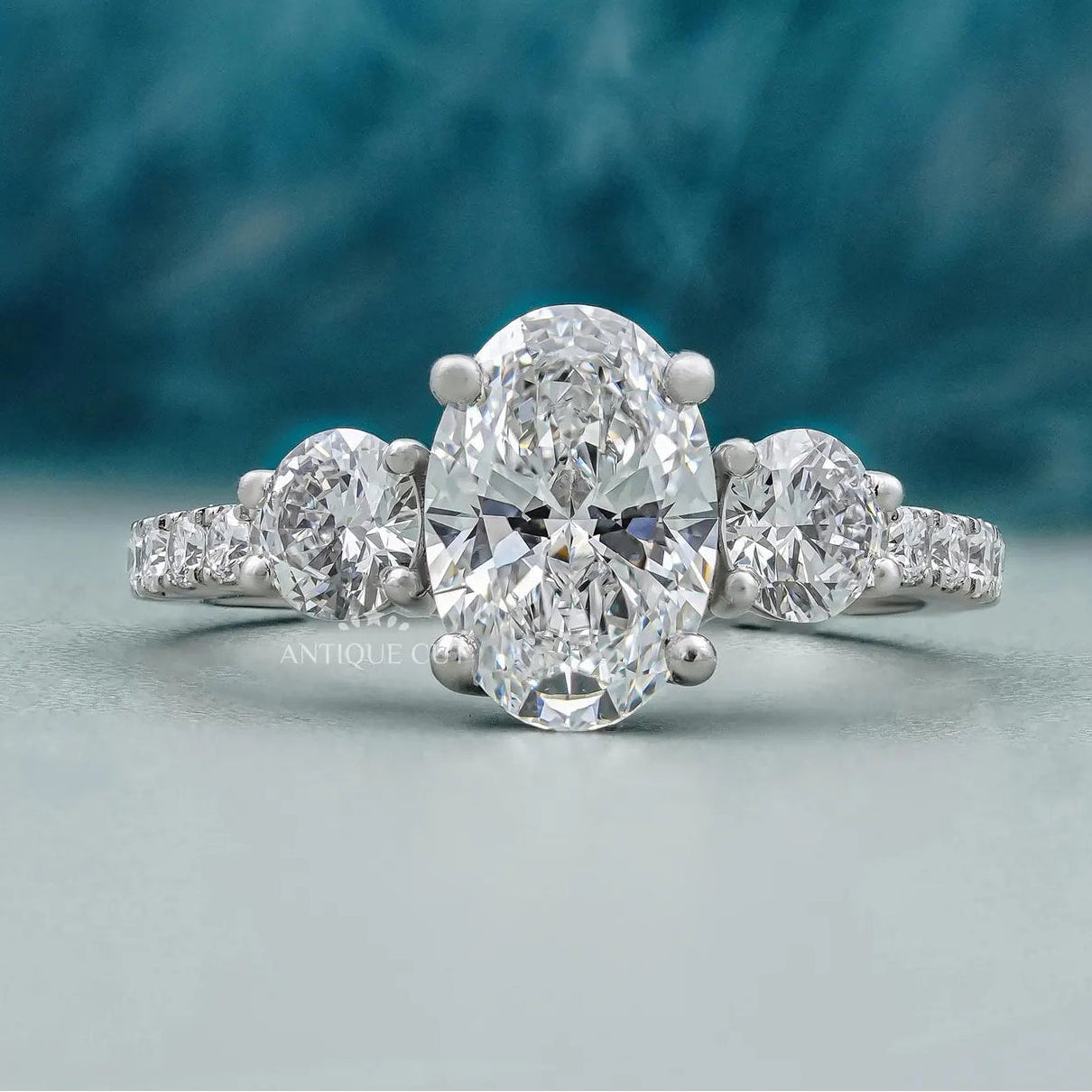 Elegant Oval Cut Diamond Engagement Ring with White Gold Pave Band | IGI Certified