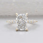 Radiant cut lab grown diamond engagement ring with claw prong setting in yellow gold