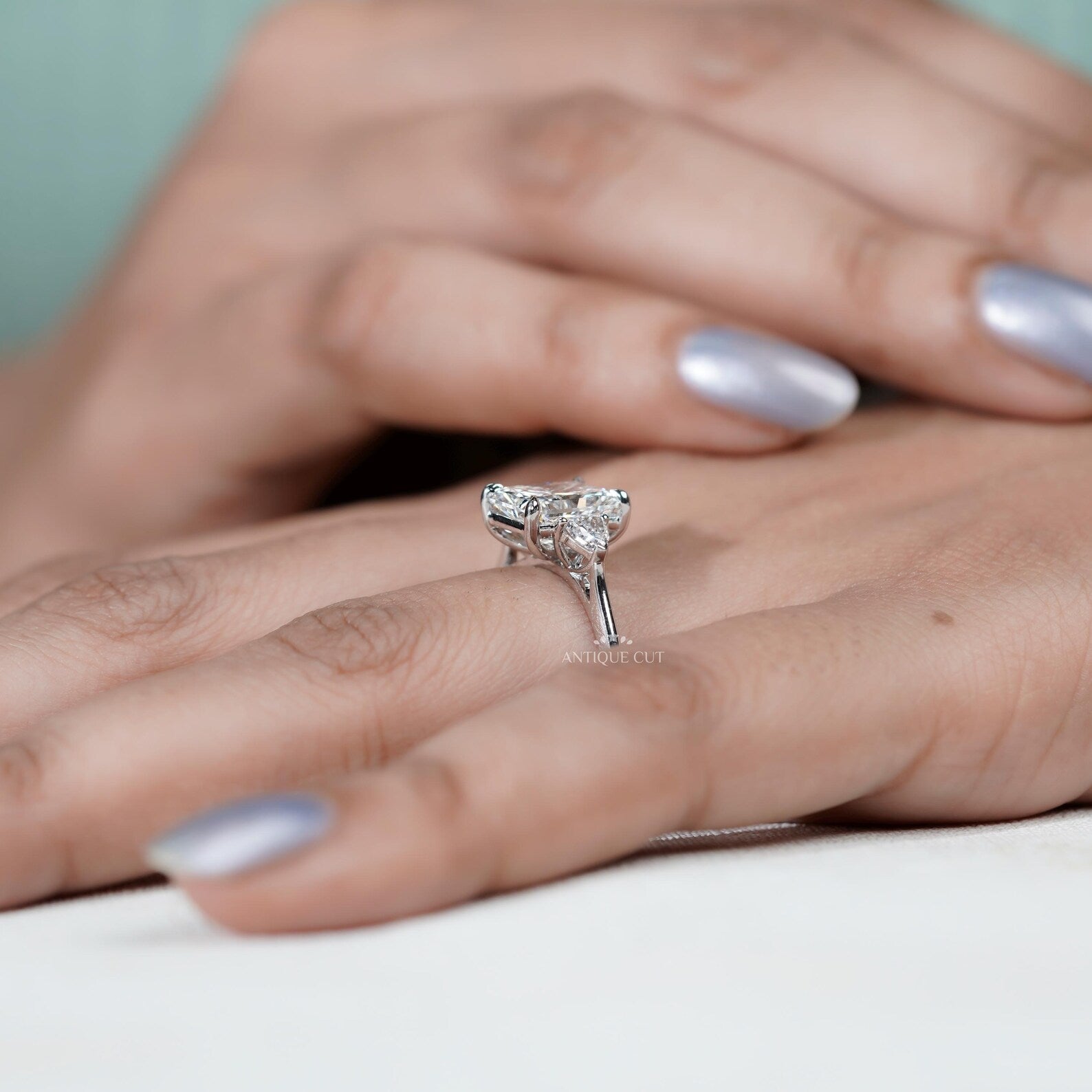 Radiant Cut Engagement Ring With Three Stone