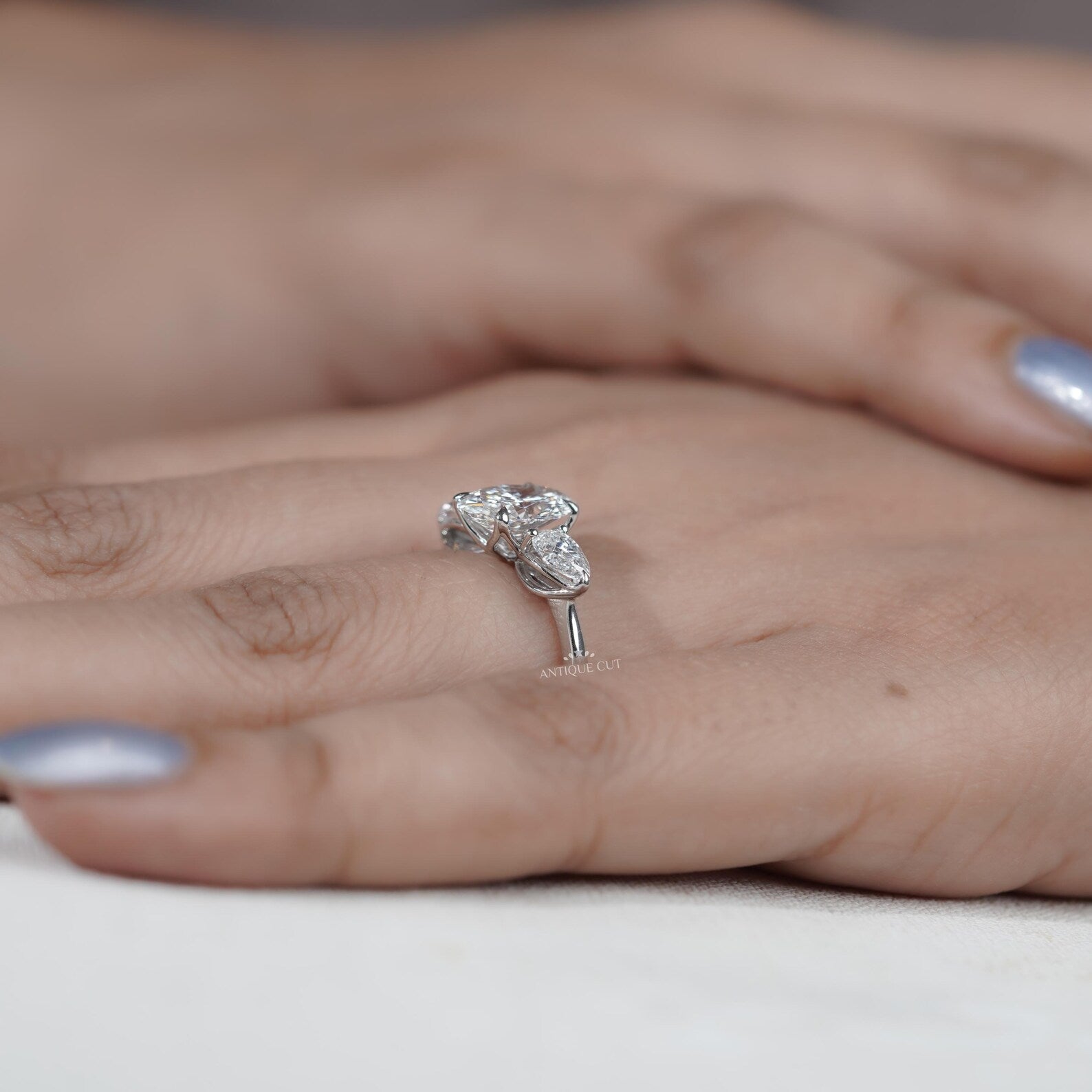 Three Stone Oval Cut Diamond Ring