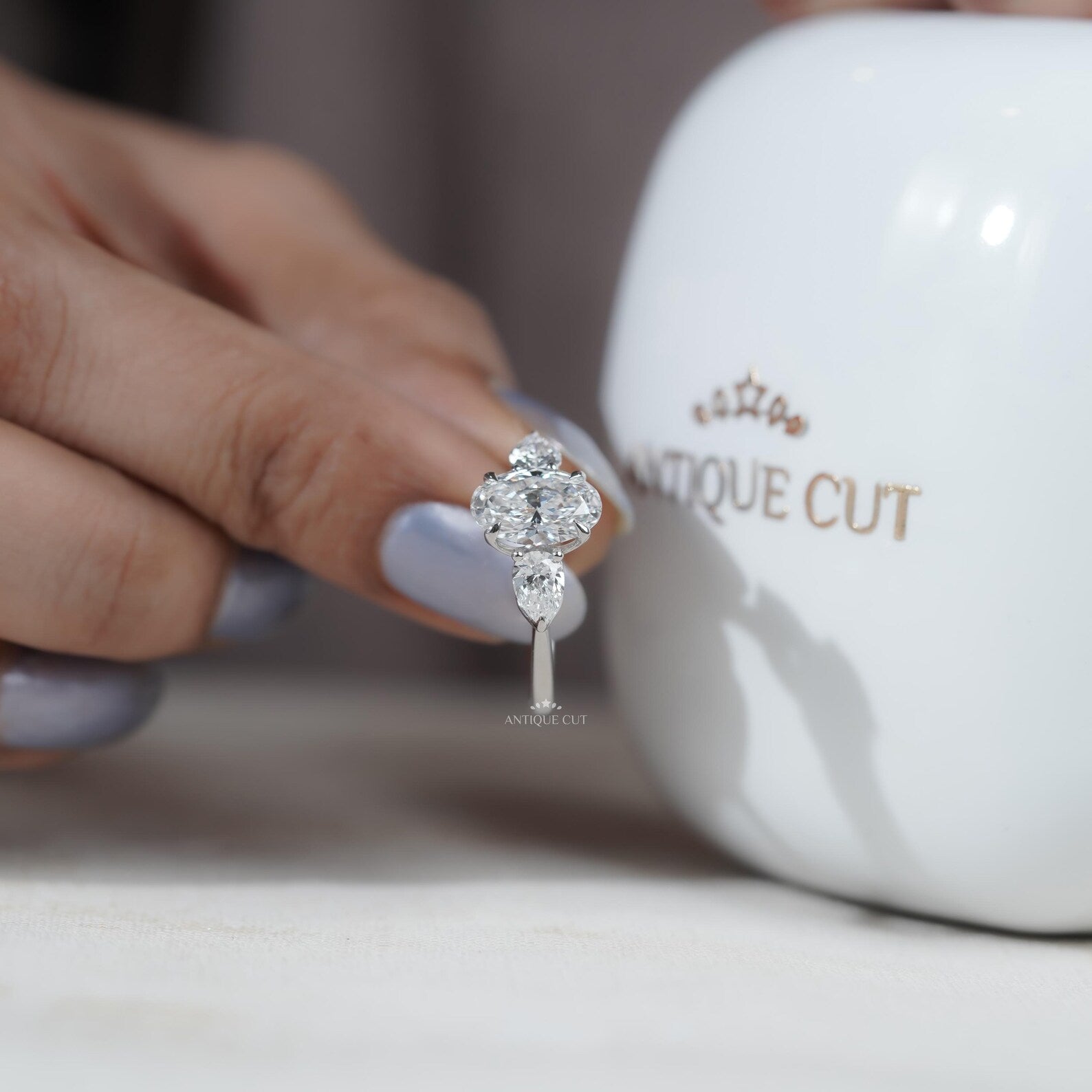 Three Stone Oval Cut Diamond Ring