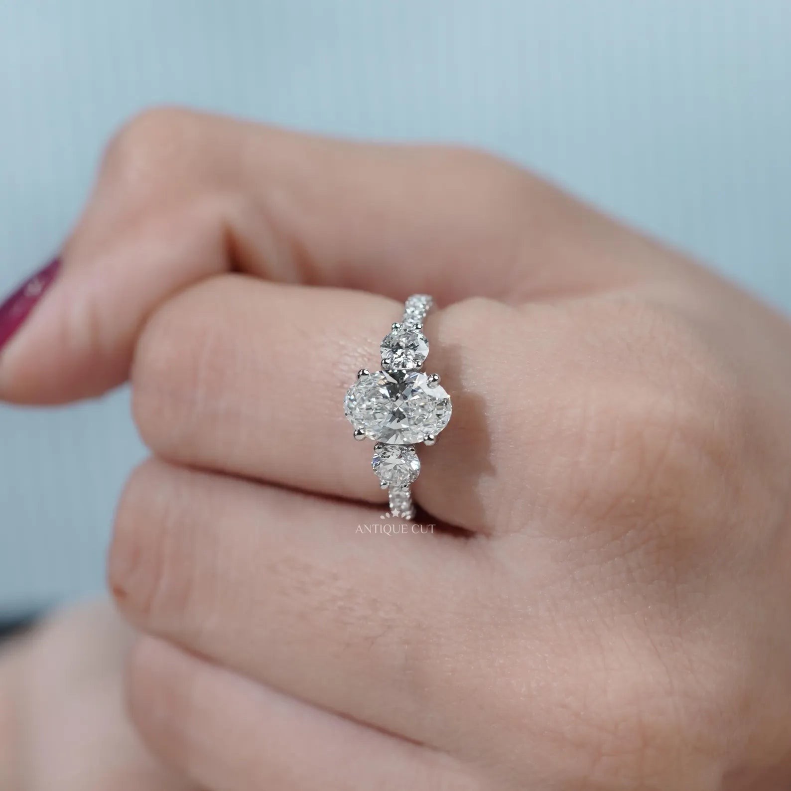 Oval Cut Diamond Ring with Pave Band