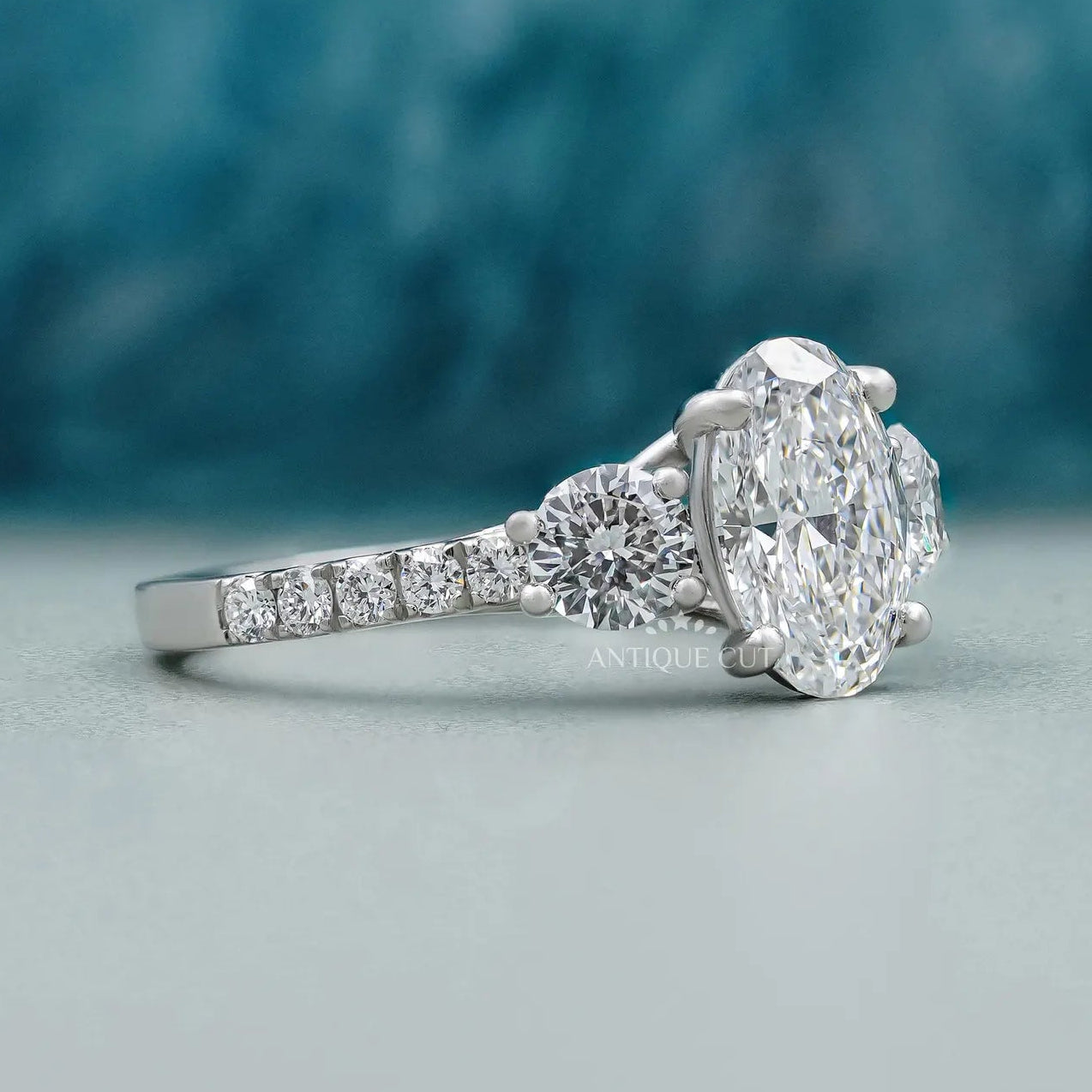 Elegant Oval Cut Diamond Engagement Ring with White Gold Pave Band | IGI Certified