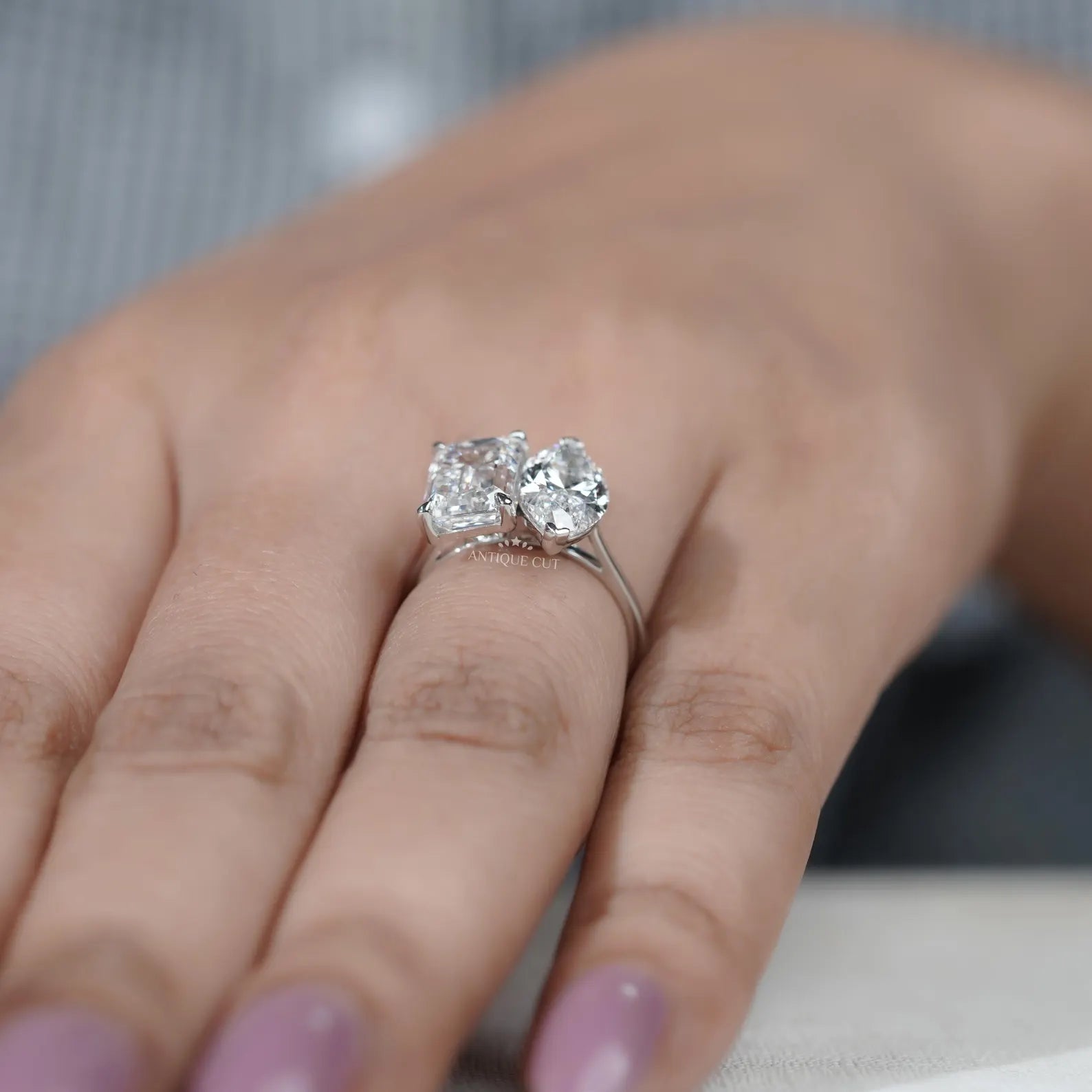 Emerald and Marquise Two stone Engagement Ring
