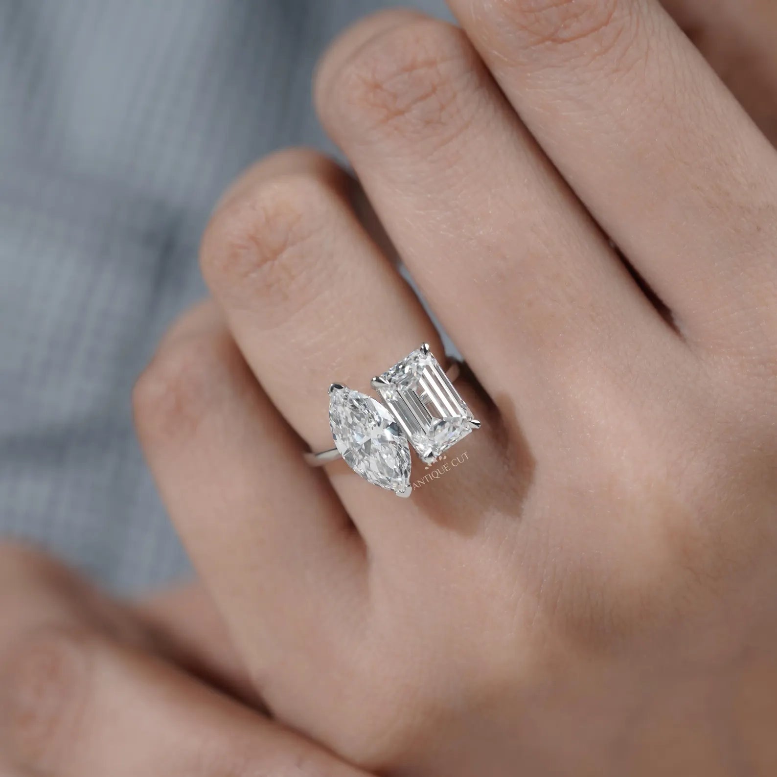 Emerald and Marquise Two stone Engagement Ring