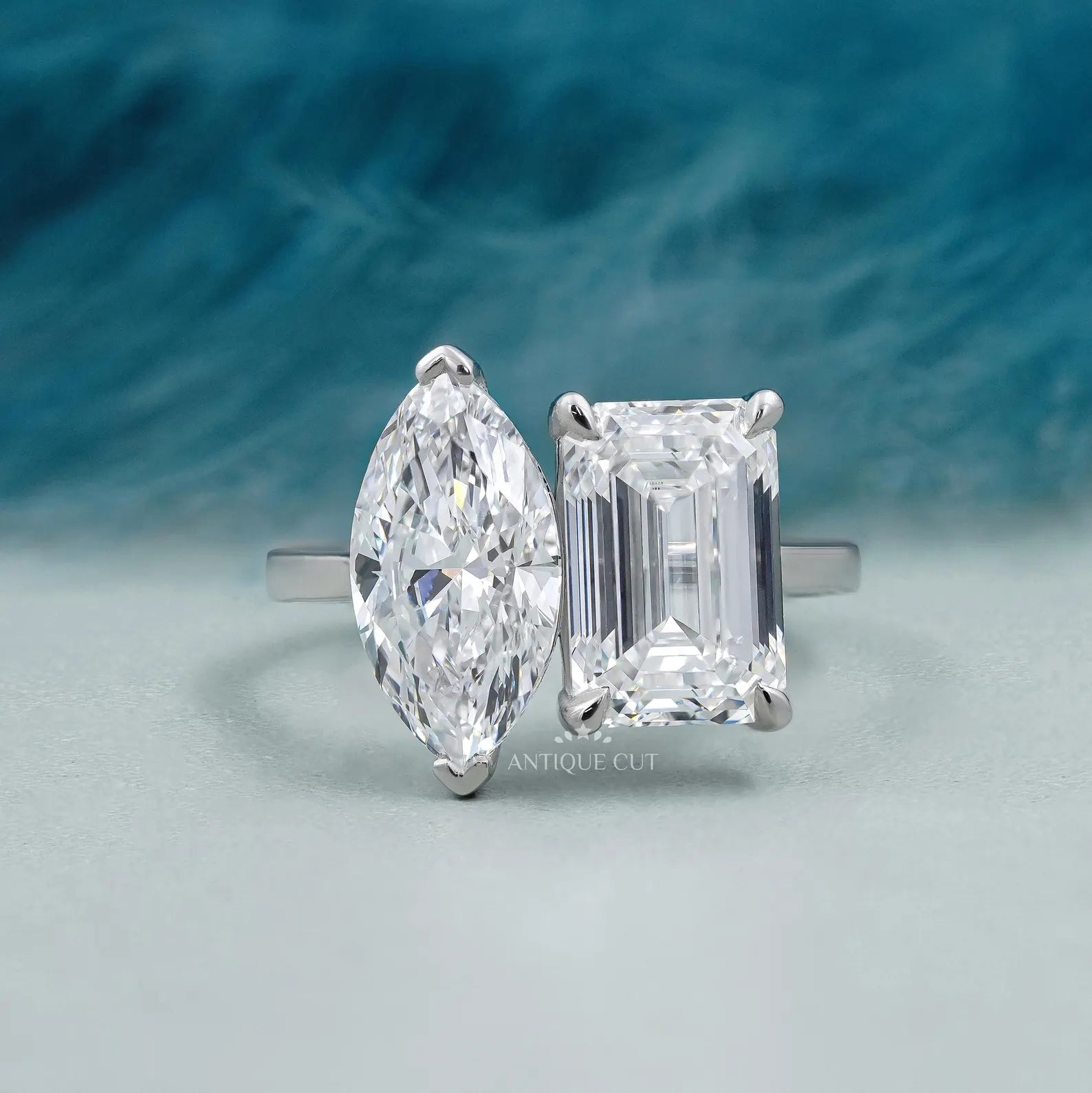 Emerald and Marquise Two stone Engagement Ring