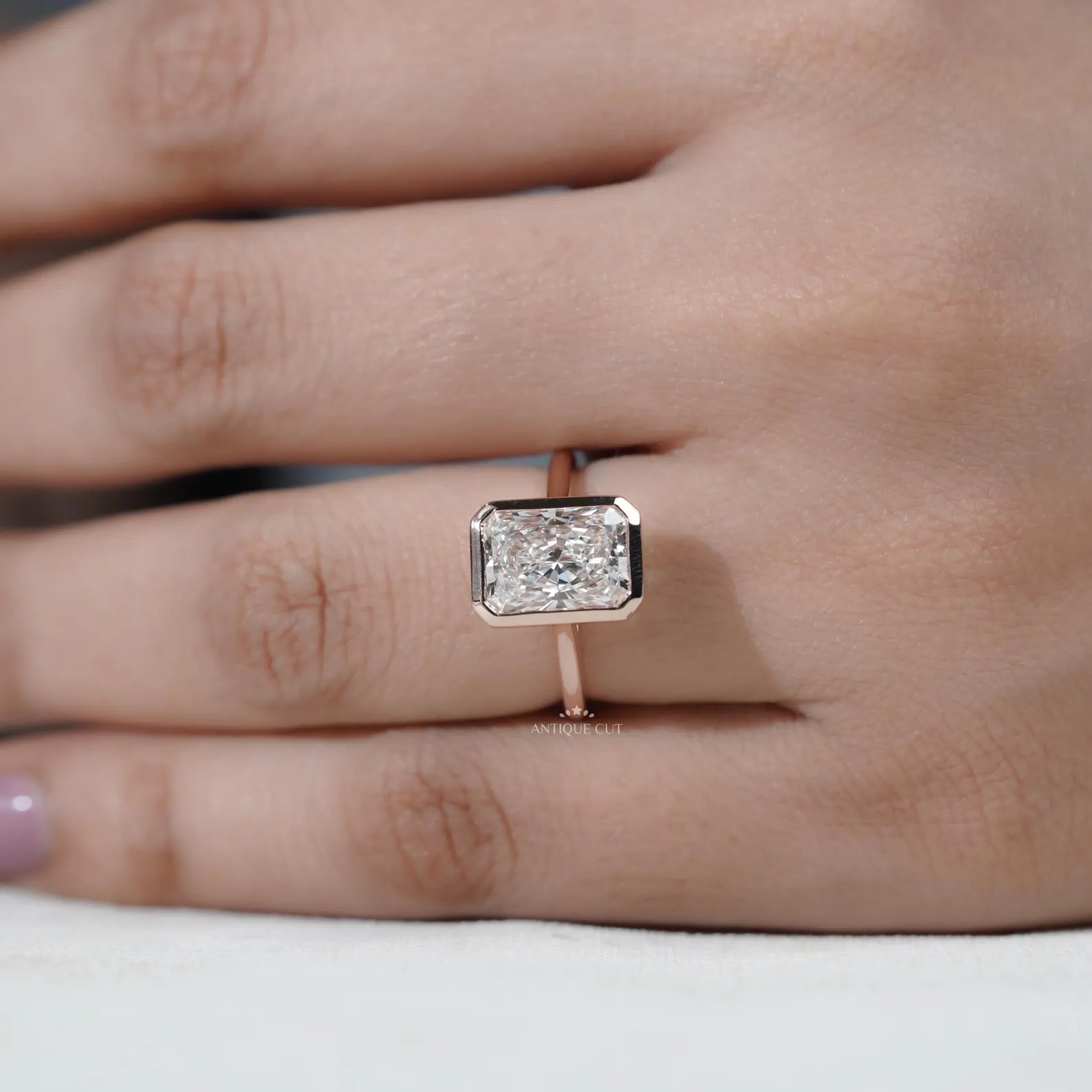 Radiant Cut Engagement Ring with Bezel Set Diamond