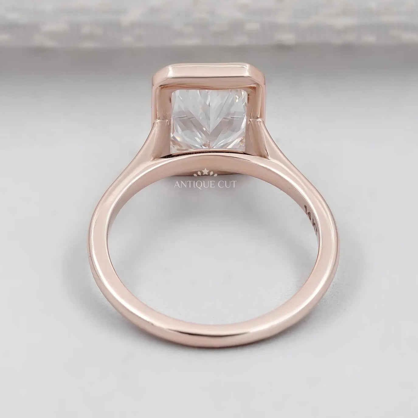 Radiant Cut Engagement Ring with Bezel Set Diamond