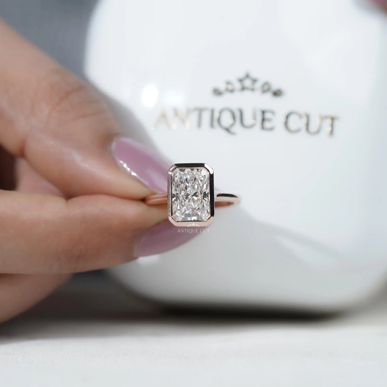 Radiant Cut Engagement Ring with Bezel Set Diamond