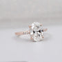 Rose gold oval diamond ring with cathedral setting