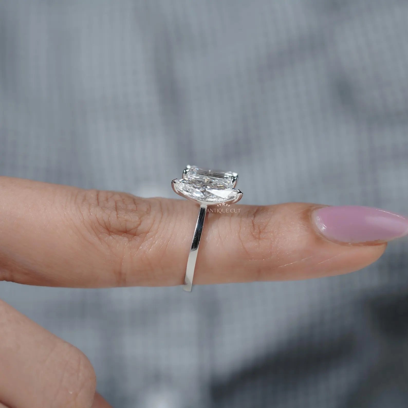 Emerald and Marquise Two stone Engagement Ring