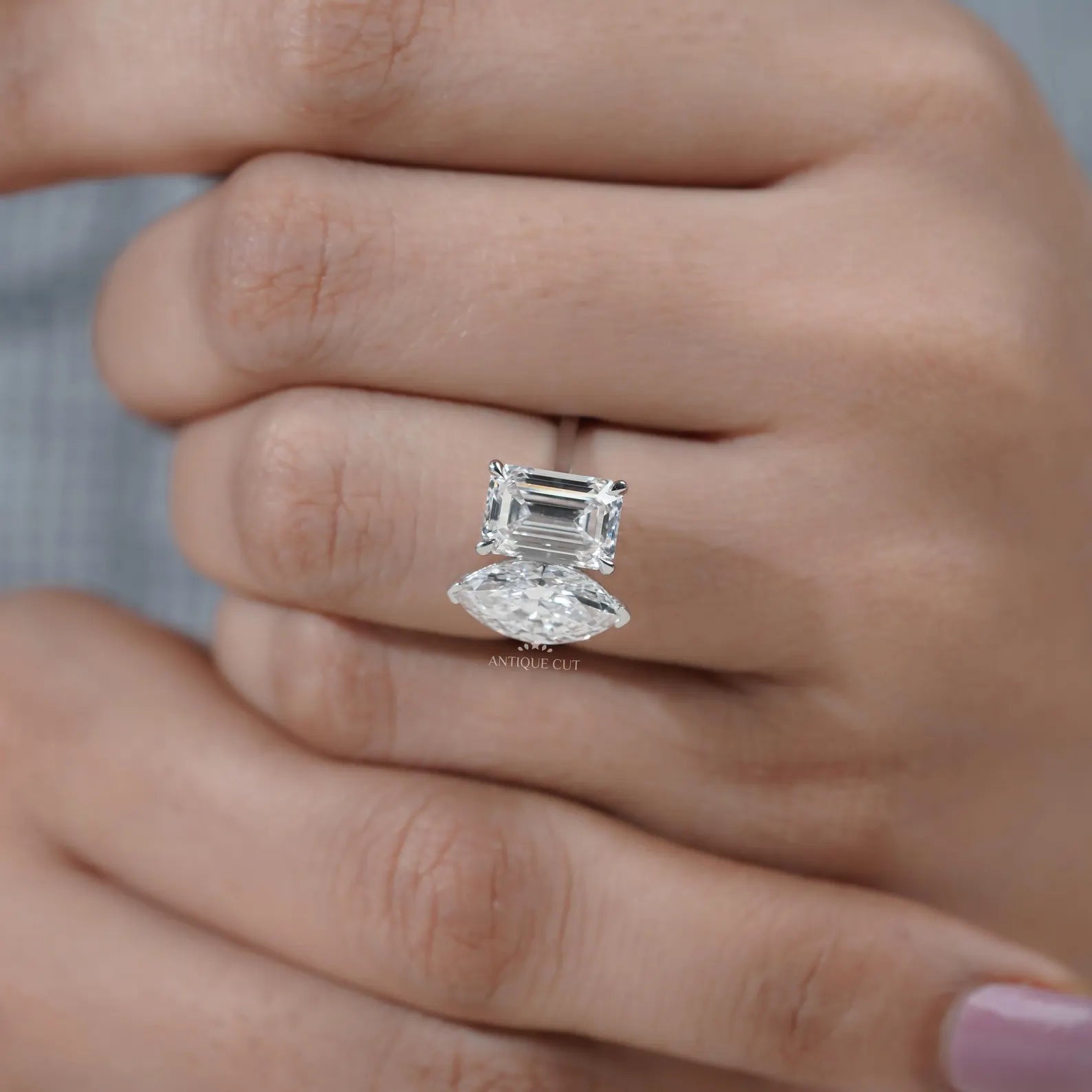 Emerald and Marquise Two stone Engagement Ring