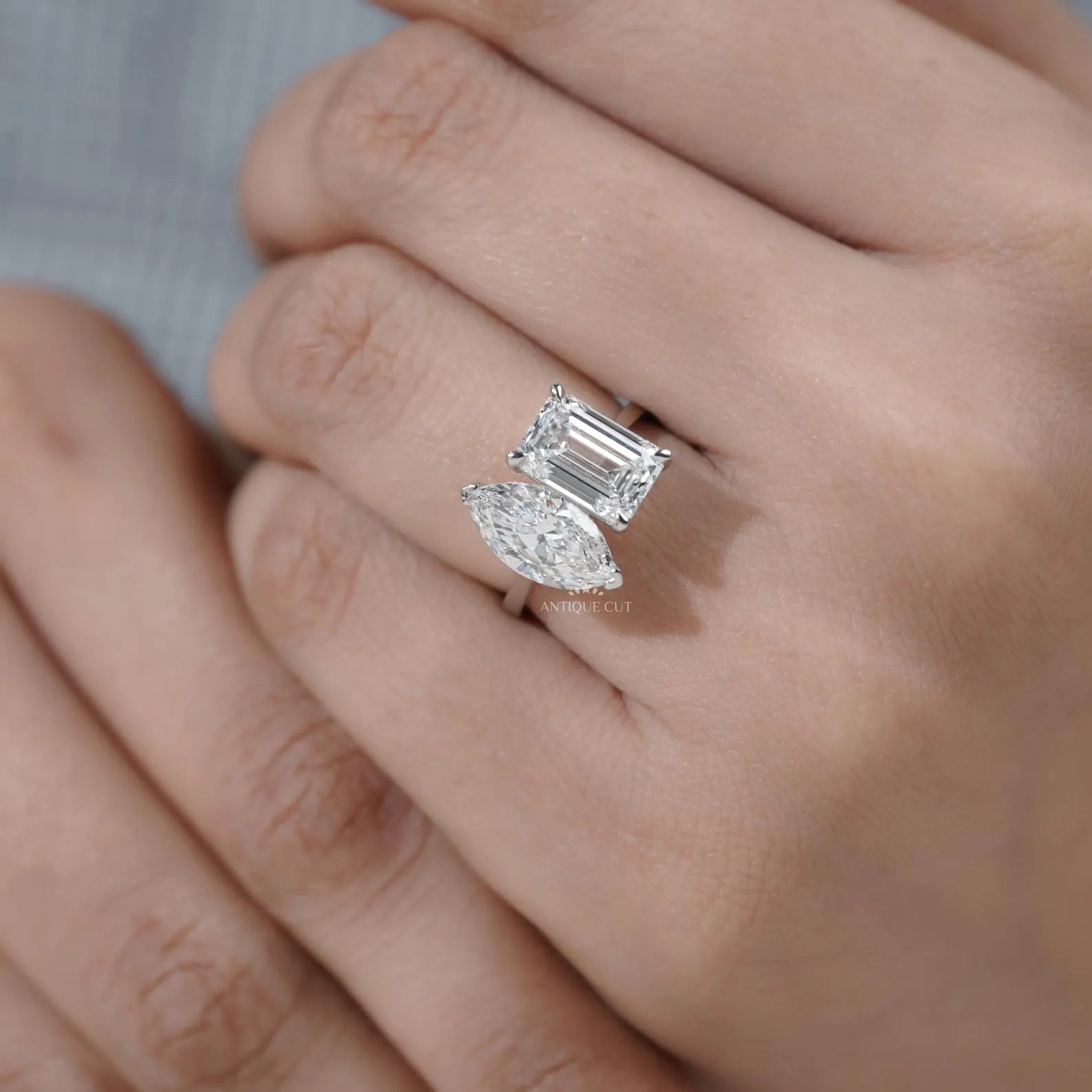 Emerald and Marquise Two stone Engagement Ring