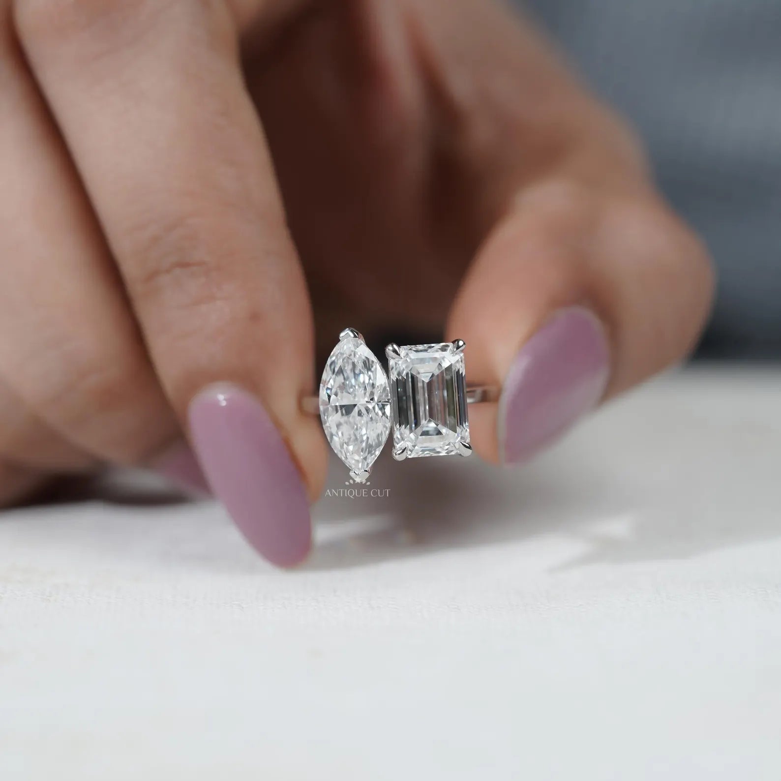Emerald and Marquise Two stone Engagement Ring