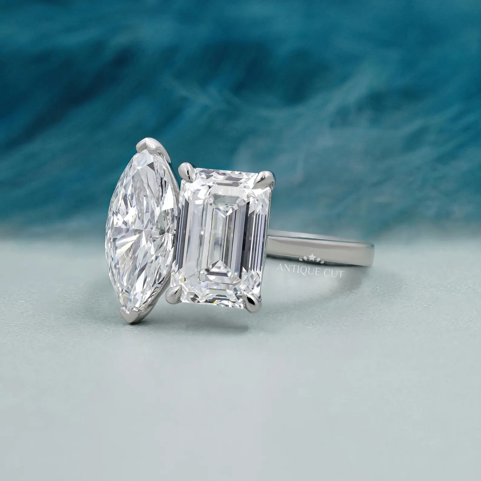 Emerald and Marquise Two stone Engagement Ring