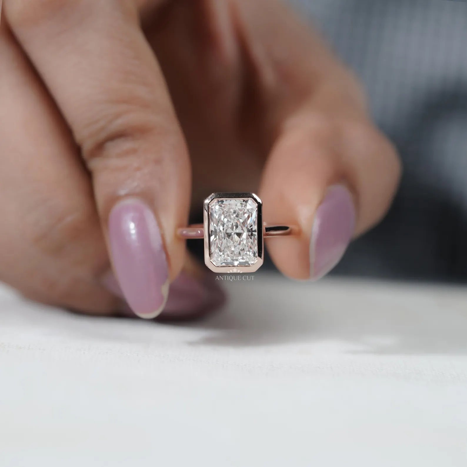 Radiant Cut Engagement Ring with Bezel Set Diamond