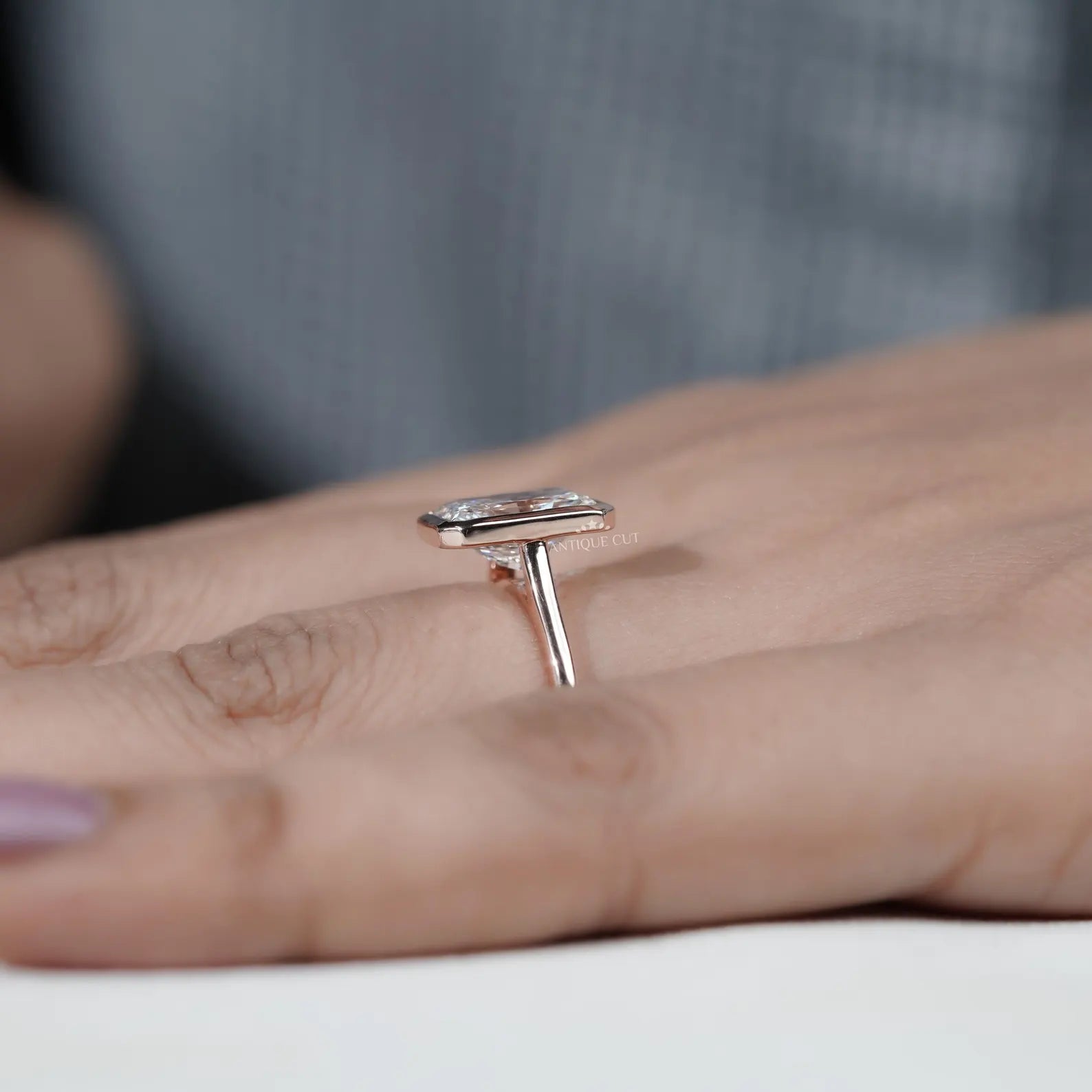 Radiant Cut Engagement Ring with Bezel Set Diamond