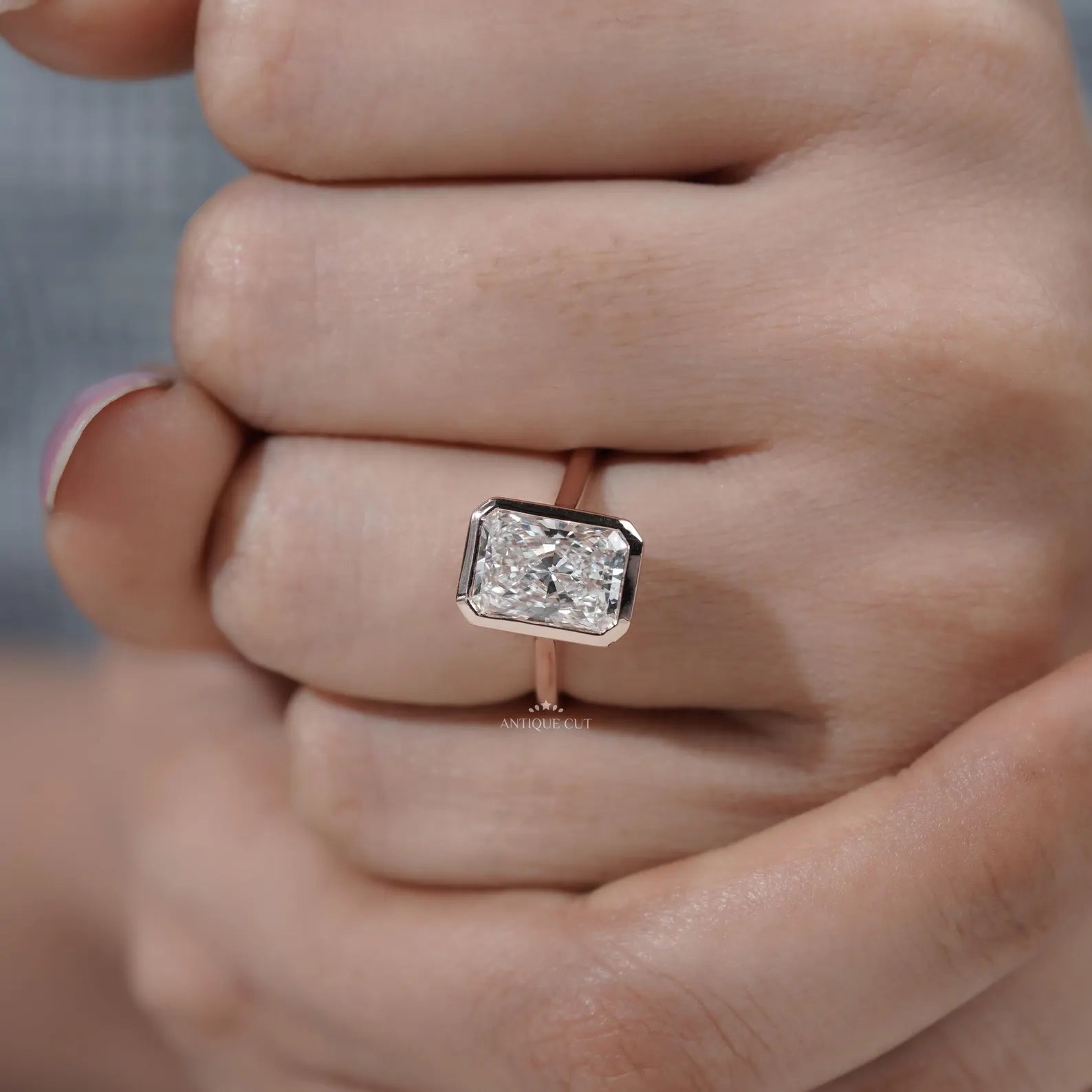 Radiant Cut Engagement Ring with Bezel Set Diamond