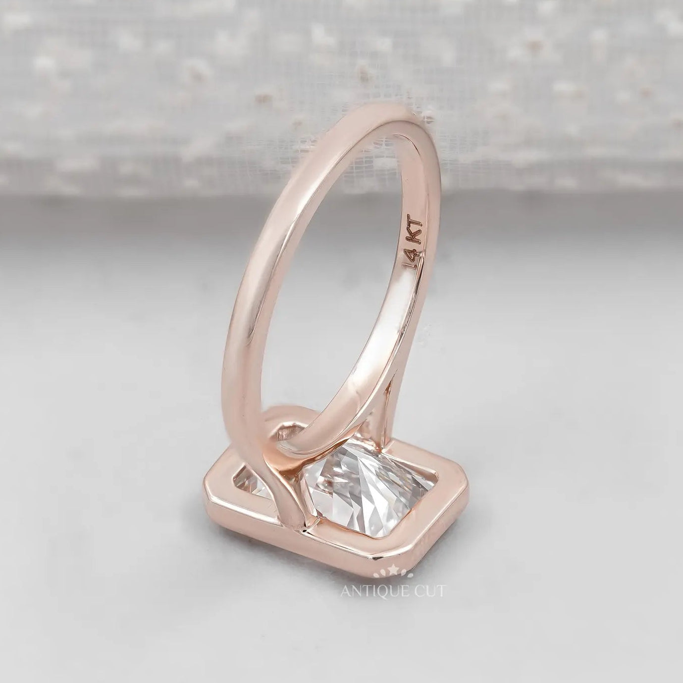 Radiant Cut Engagement Ring with Bezel Set Diamond