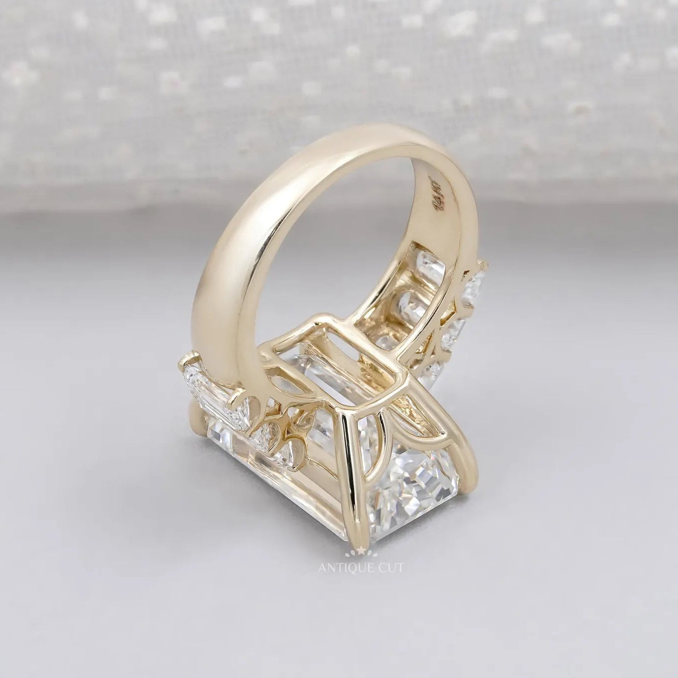 Emerald Cut Diamond Engagement Ring with Tapered Side Stones