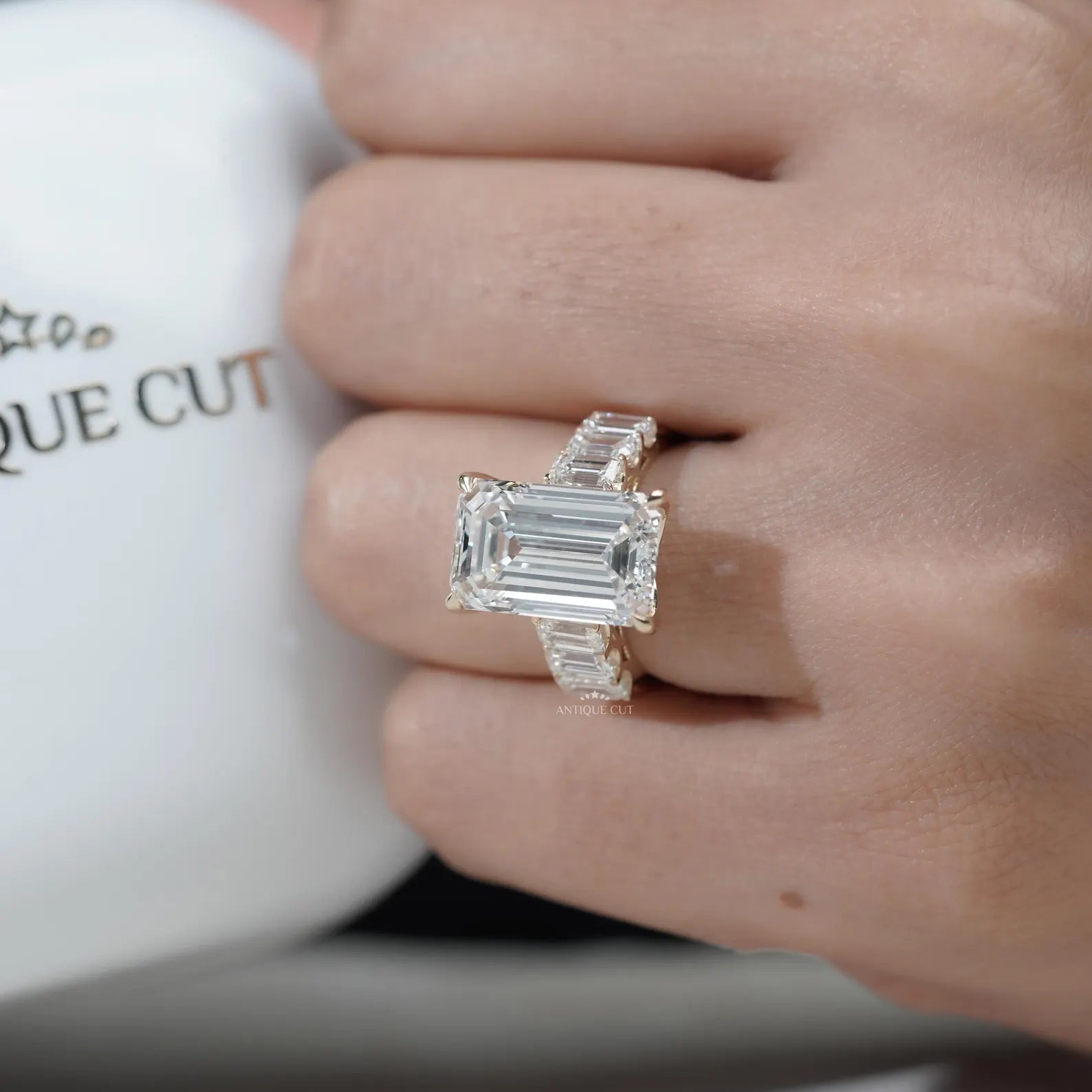Emerald Cut Diamond Engagement Ring with Tapered Side Stones