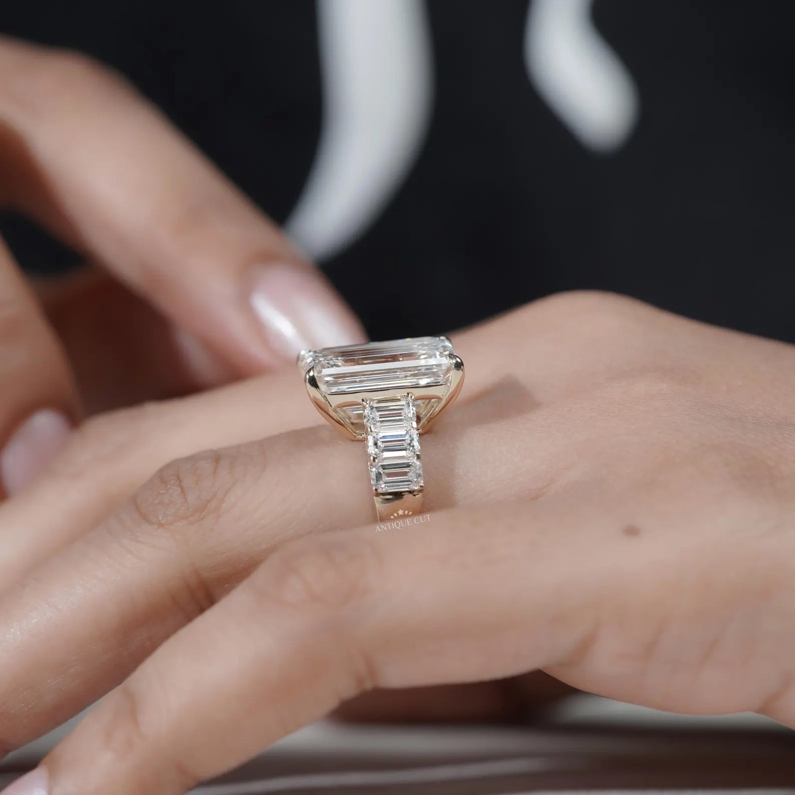 Emerald Cut Diamond Engagement Ring with Tapered Side Stones