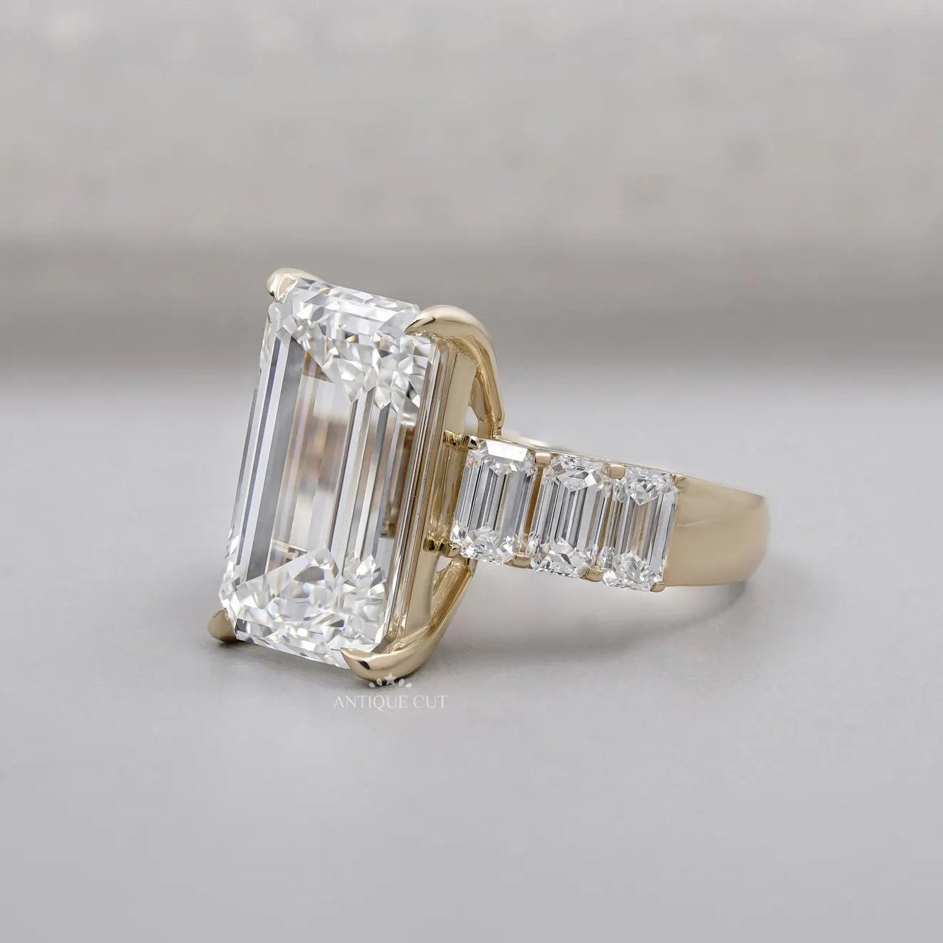 Emerald Cut Diamond Engagement Ring with Tapered Side Stones