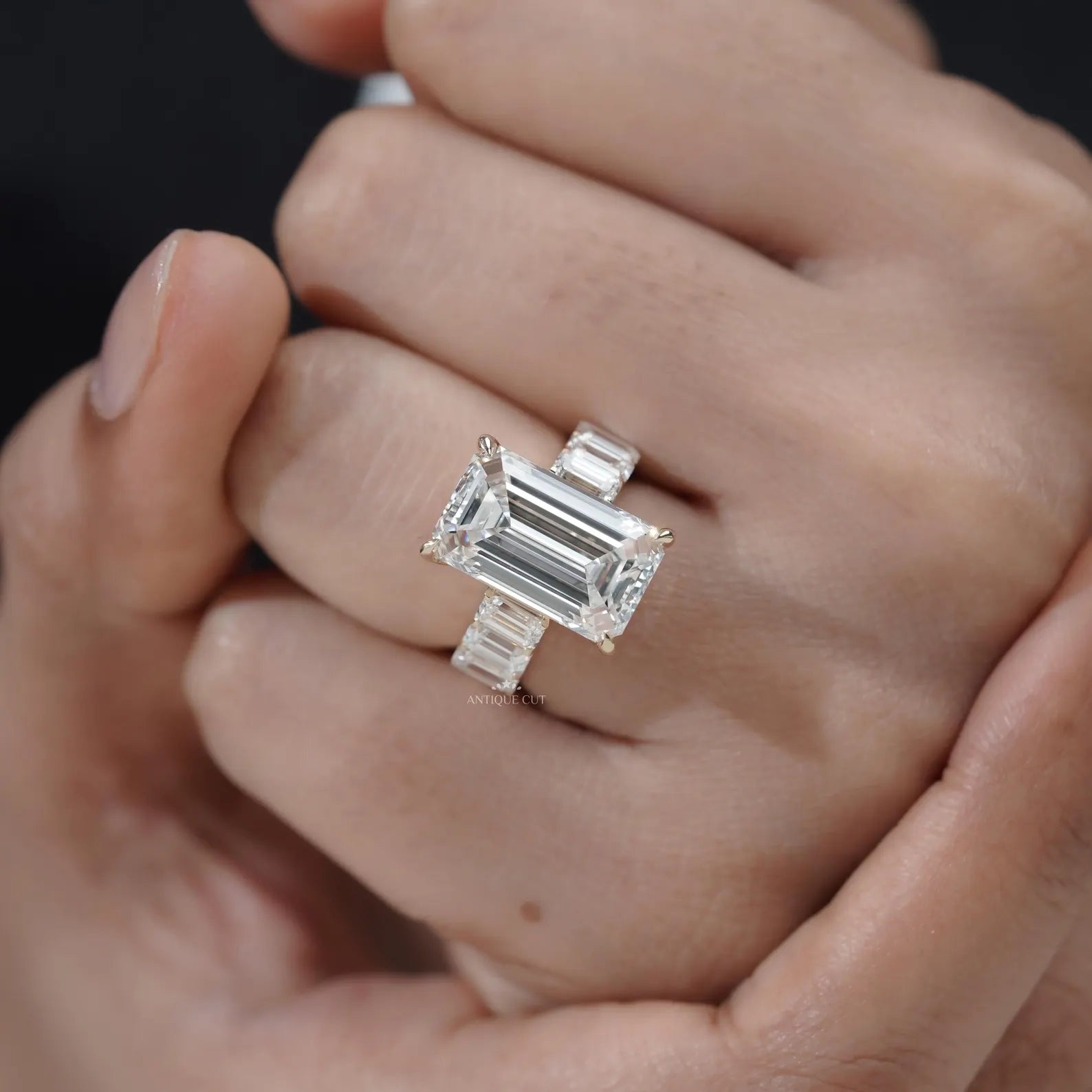 Emerald Cut Diamond Engagement Ring with Tapered Side Stones
