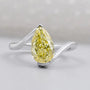 Yellow pear cut diamond wedding ring with IGI certified stone