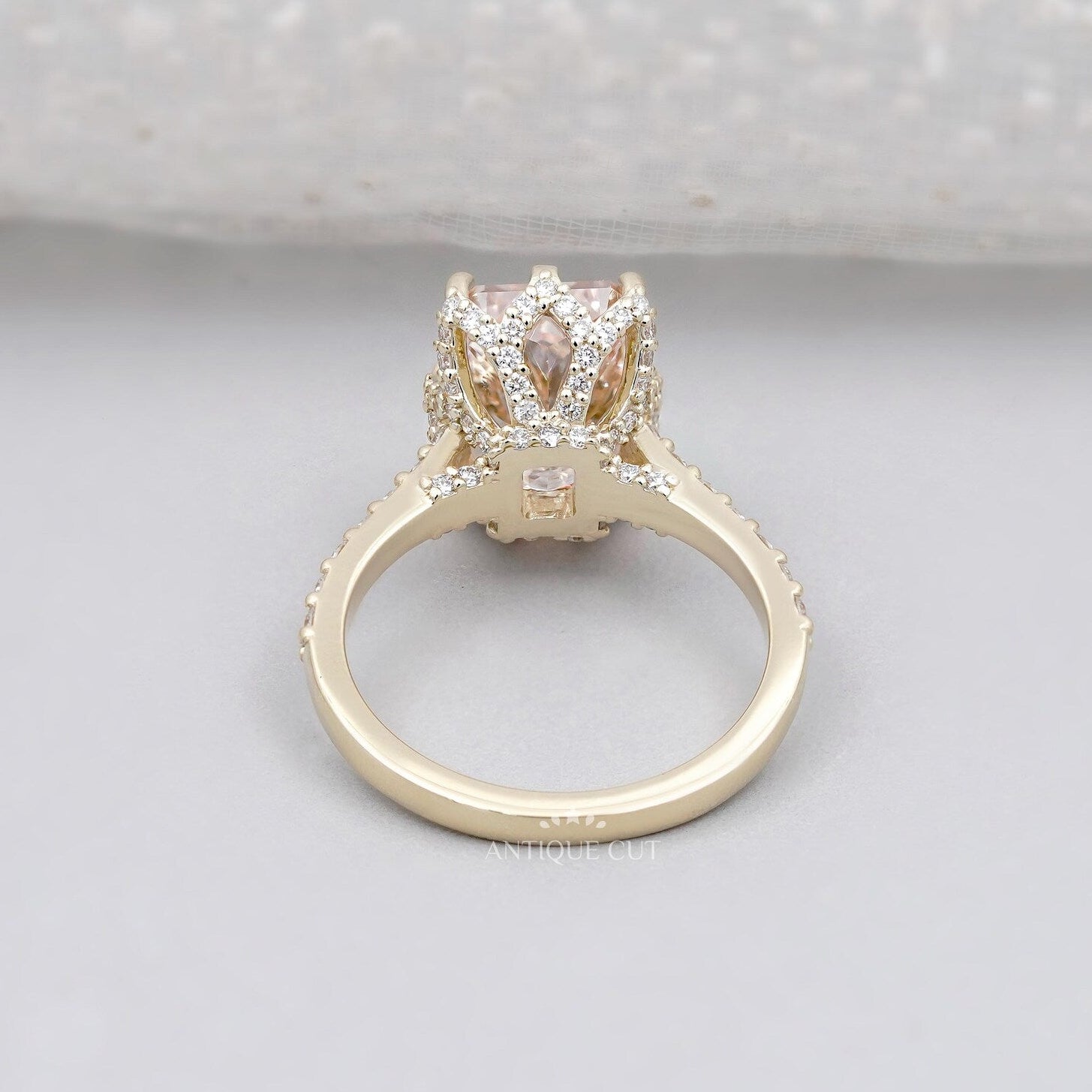 Antiquecut radiant pink diamond hidden halo engagement ring