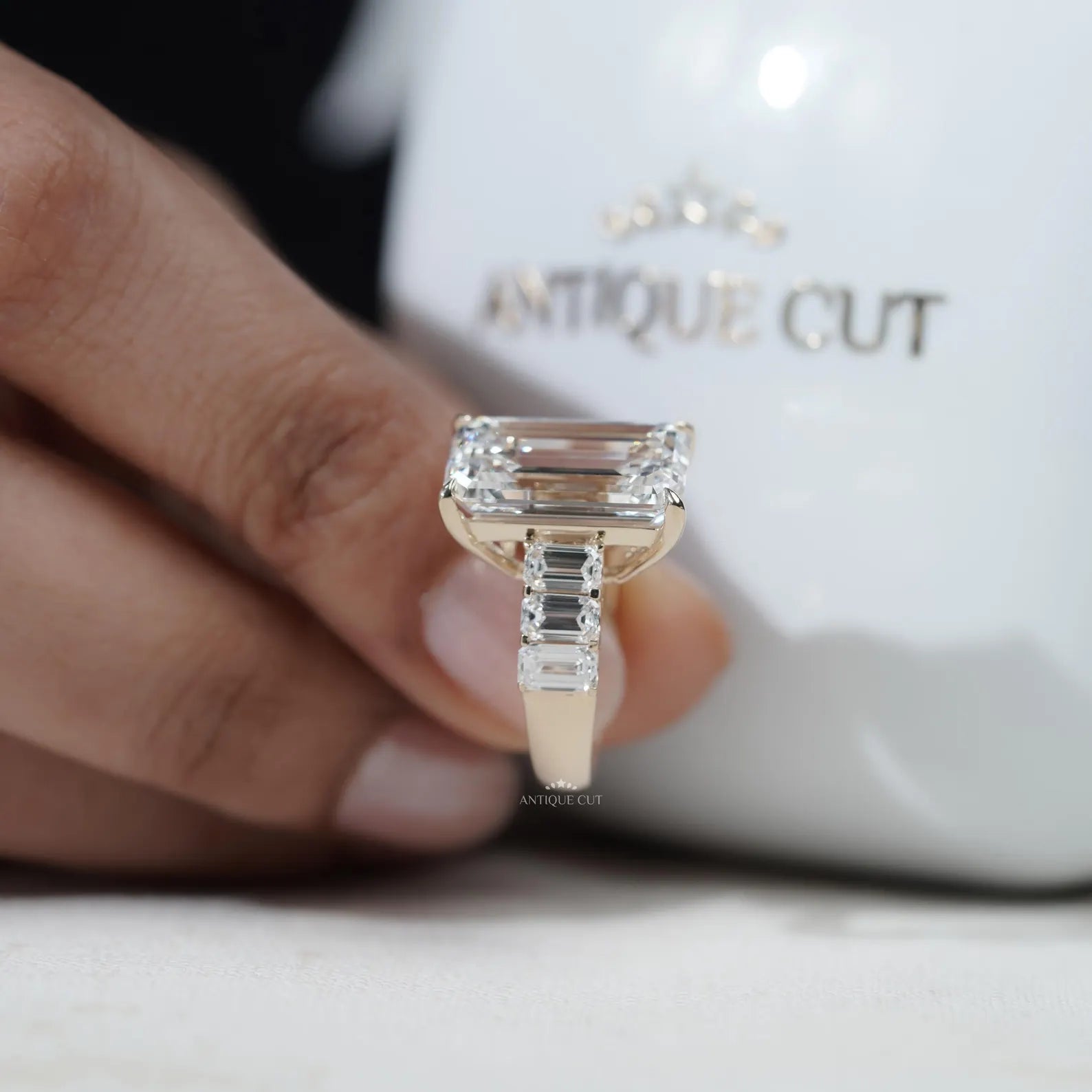 Emerald Cut Diamond Engagement Ring with Tapered Side Stones