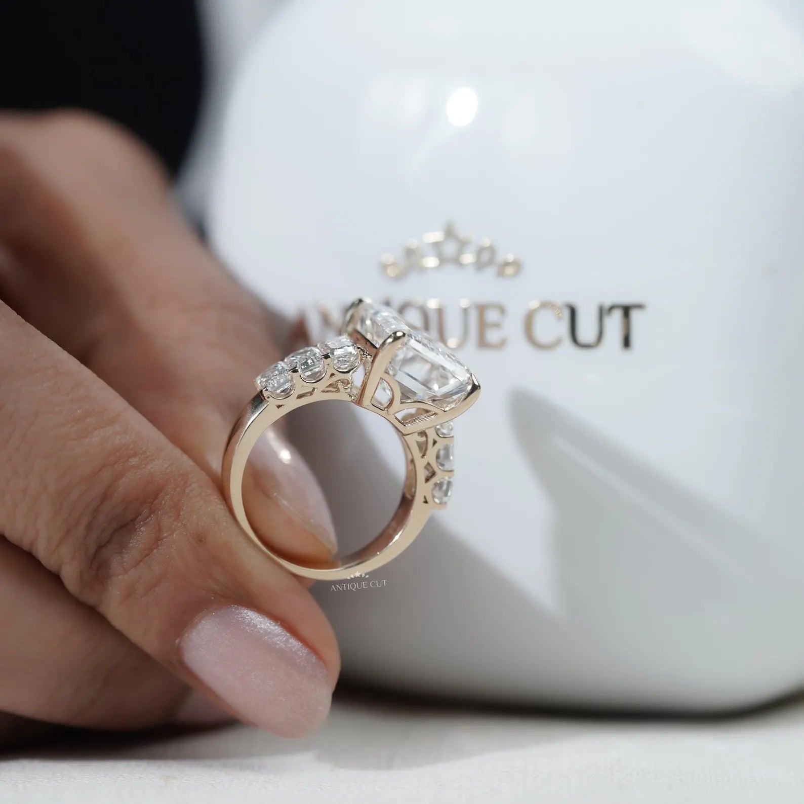 Emerald Cut Diamond Engagement Ring with Tapered Side Stones