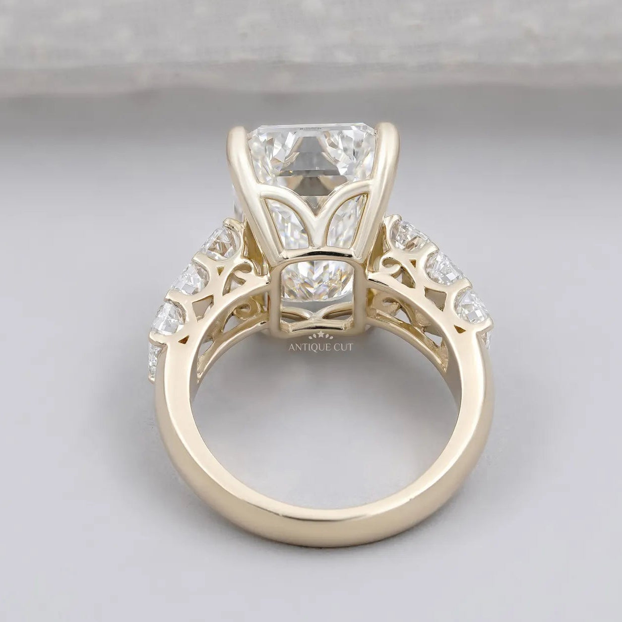 Emerald Cut Diamond Engagement Ring with Tapered Side Stones