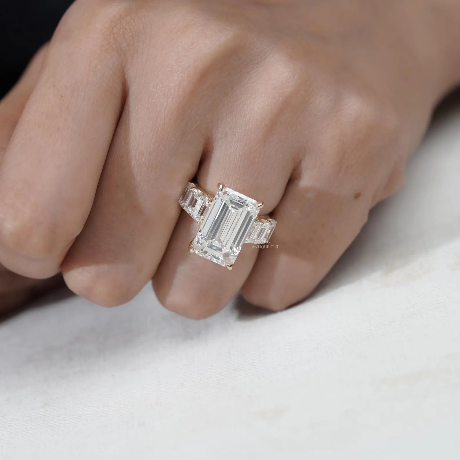 Emerald Cut Diamond Engagement Ring with Tapered Side Stones