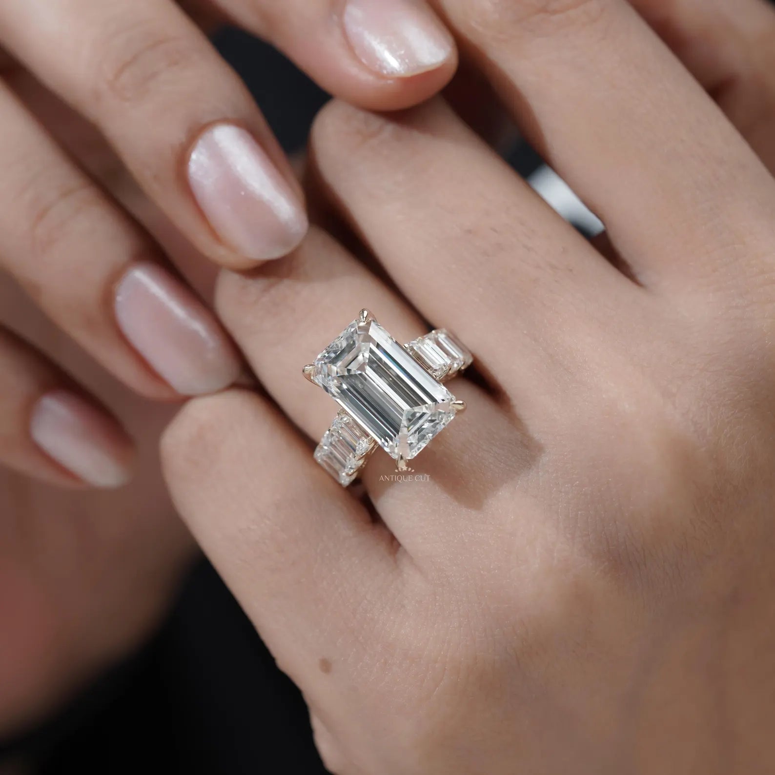 Emerald Cut Diamond Engagement Ring with Tapered Side Stones