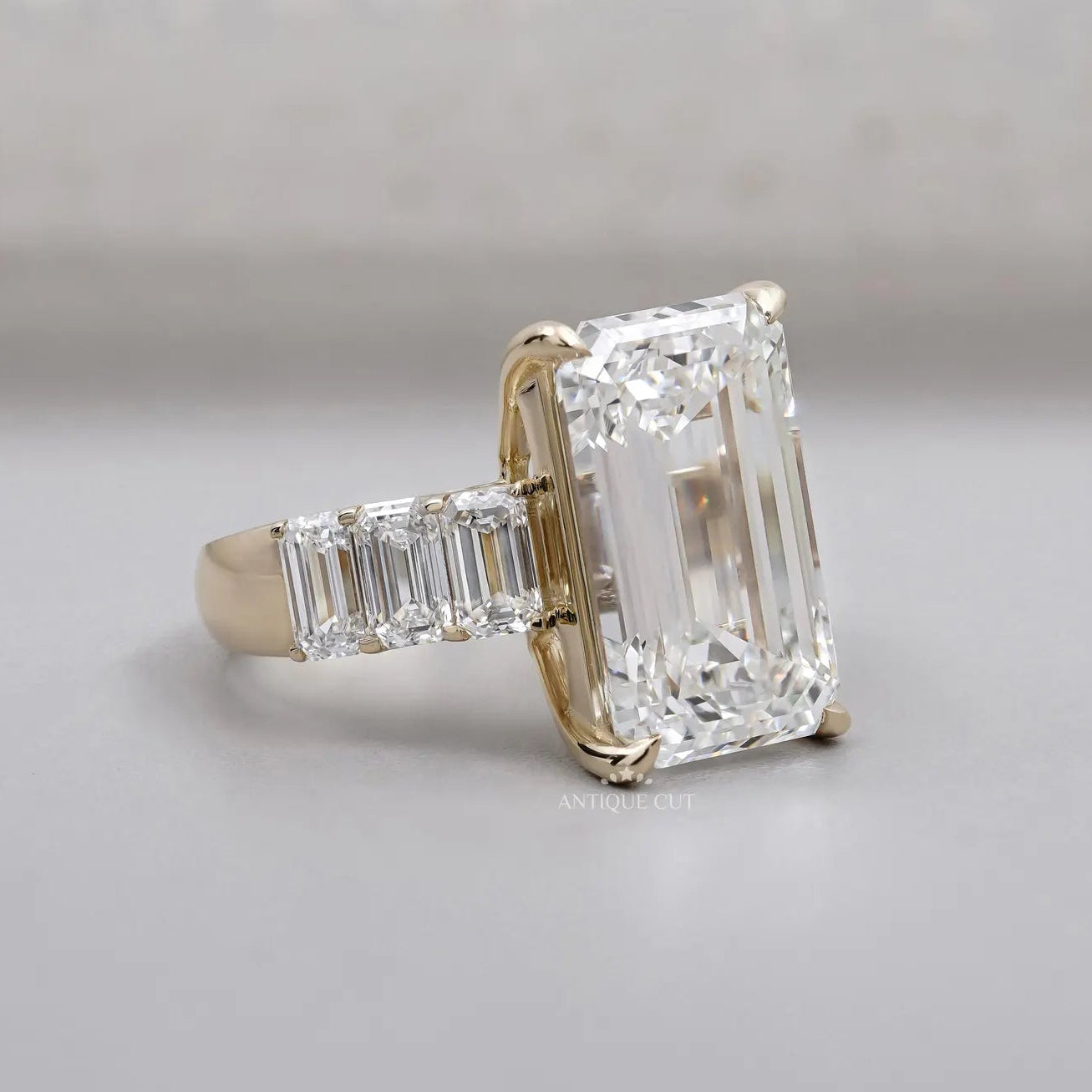 Emerald Cut Diamond Engagement Ring with Tapered Side Stones | IGI Certified